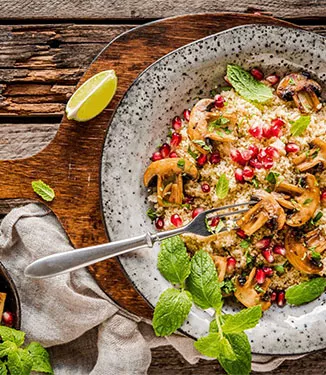 Couscous mit Zitruspilzen und Granatapfel